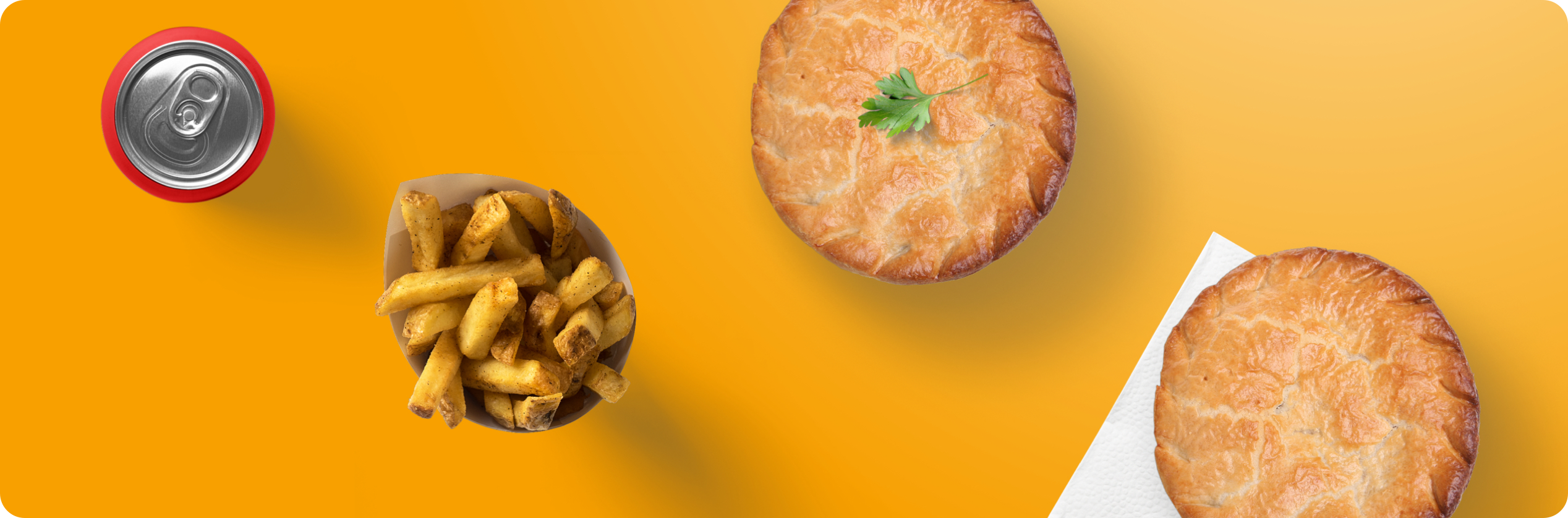 Two pies are to the right of the image. One has a leaf of parsley on top. Both have an appetising looking crust. There is a small bowl of chips next to them, and an unopened can of Coca Cola.